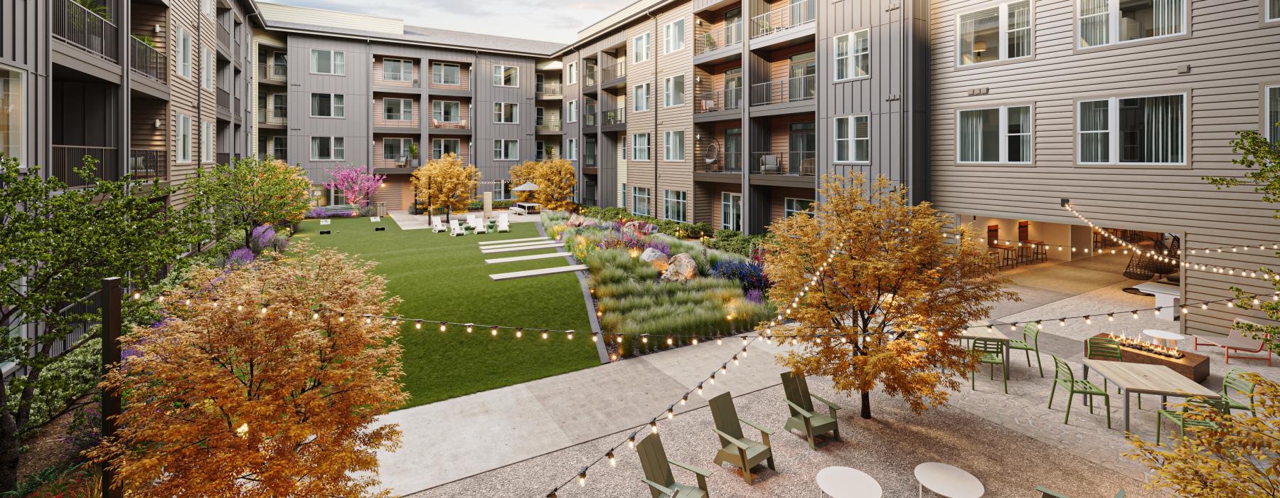 a courtyard with chairs and plants in it and buildings in the back