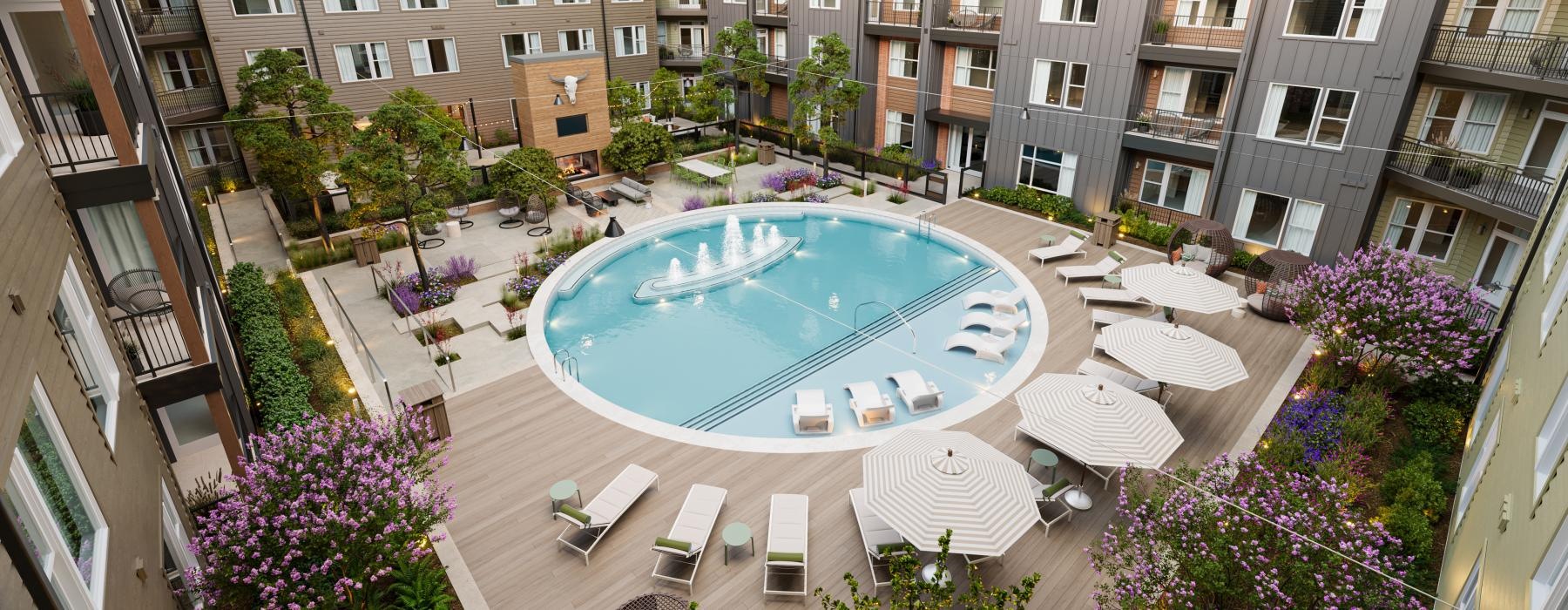 a pool in a courtyard between buildings