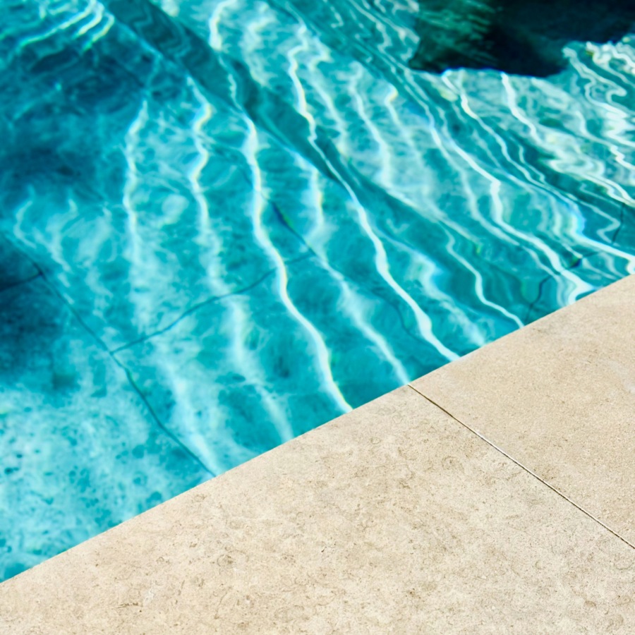 The edge of a swimming pool